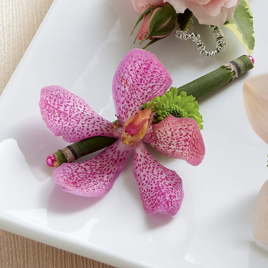 Pink Mokara Boutonniere – BELLE FLEURS & DESSINS, Lexington KY